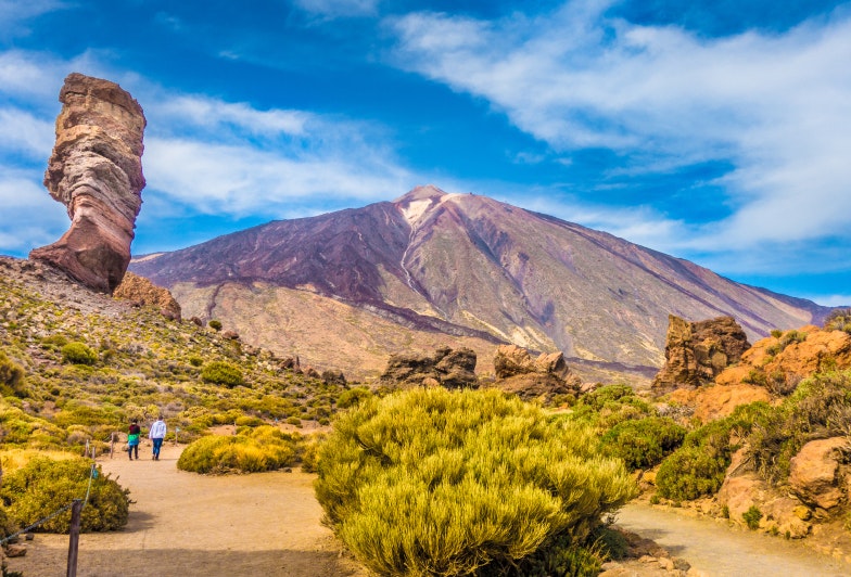 Roque Cinchado unique rock formation with famous Pico del Teide mountain volcano summit